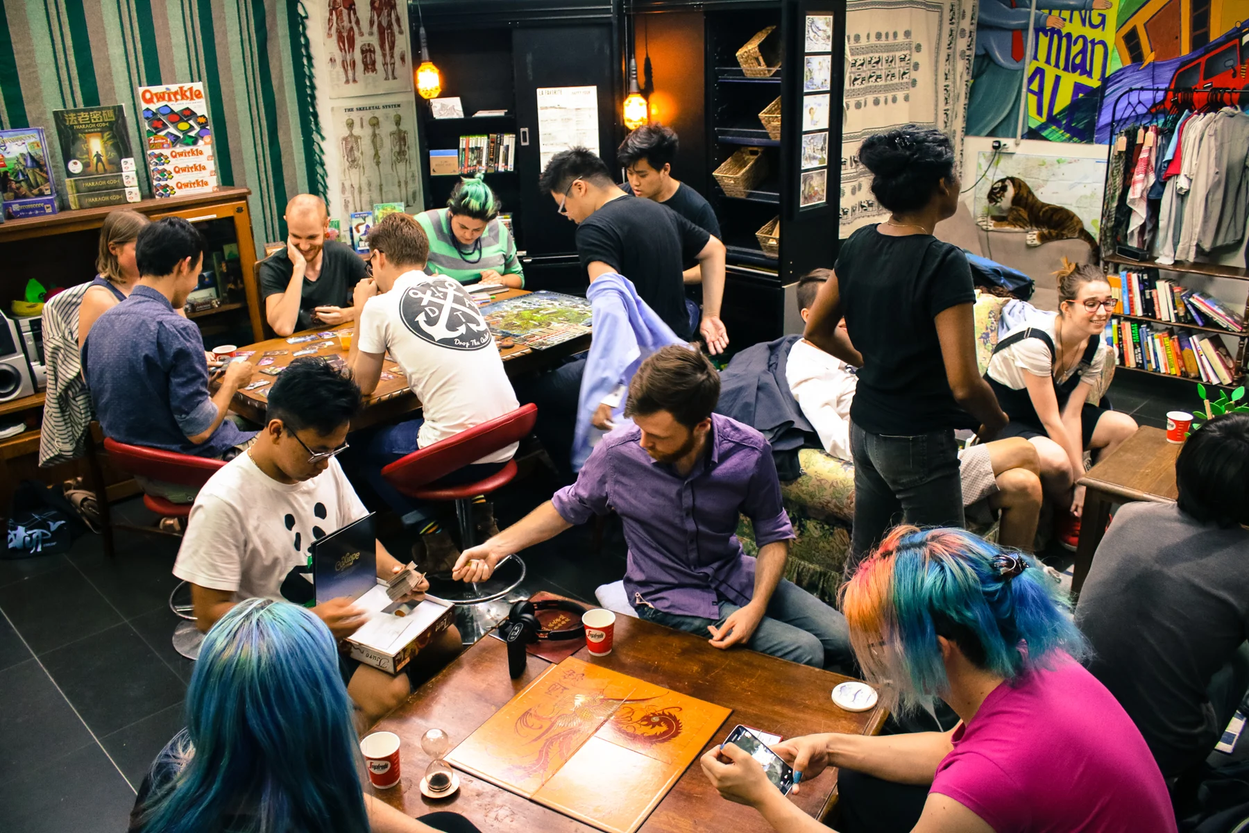 People playing tabletop games at the Inconvenience Store.