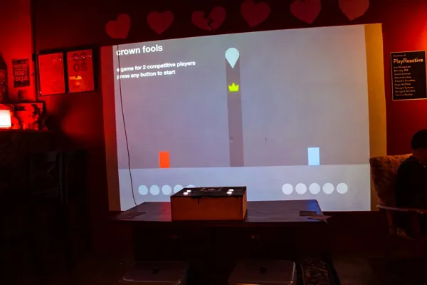 The minimalist Crown Fools game projected at BAR SK.