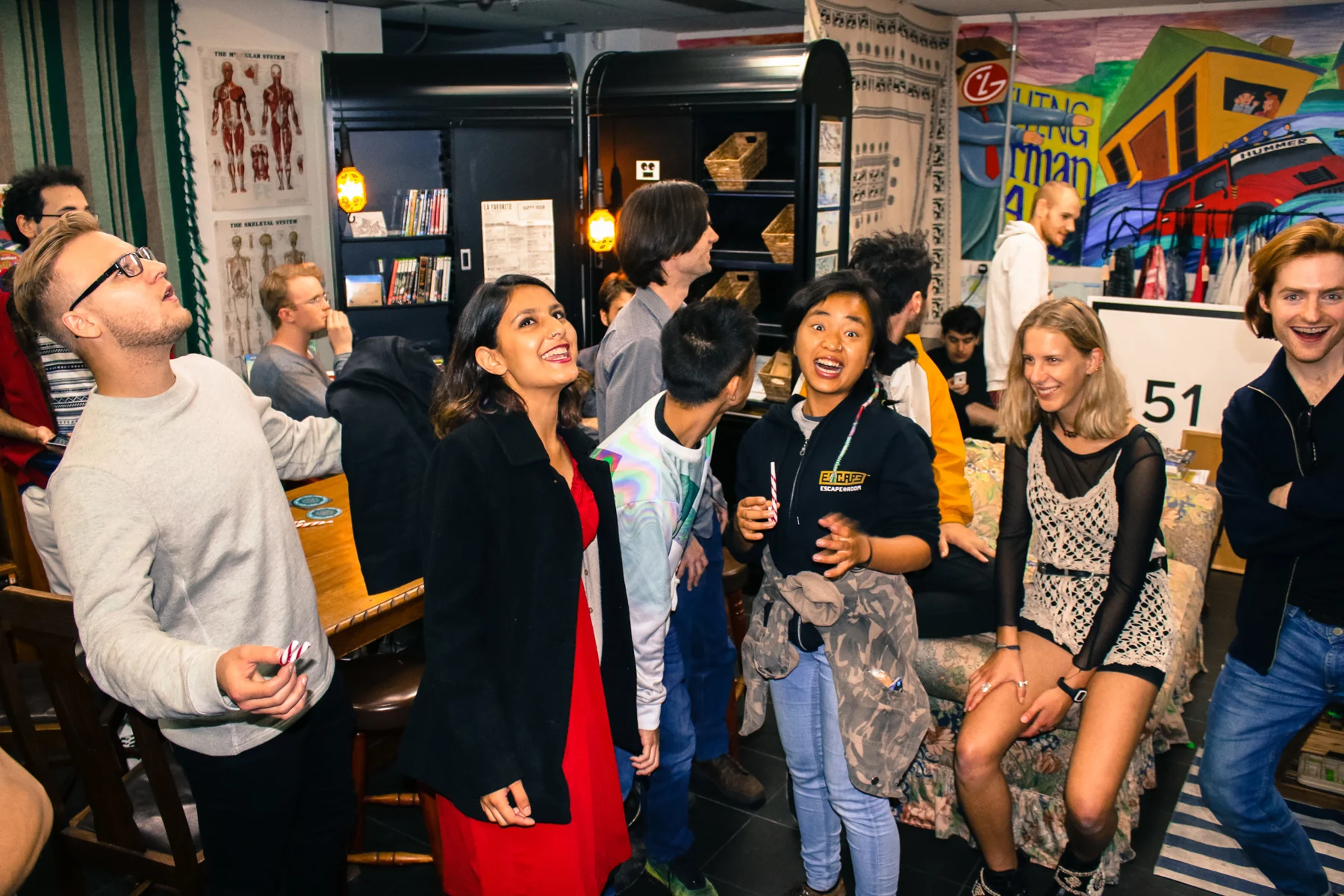 Visitors with food and games at the Inconvenience Store.