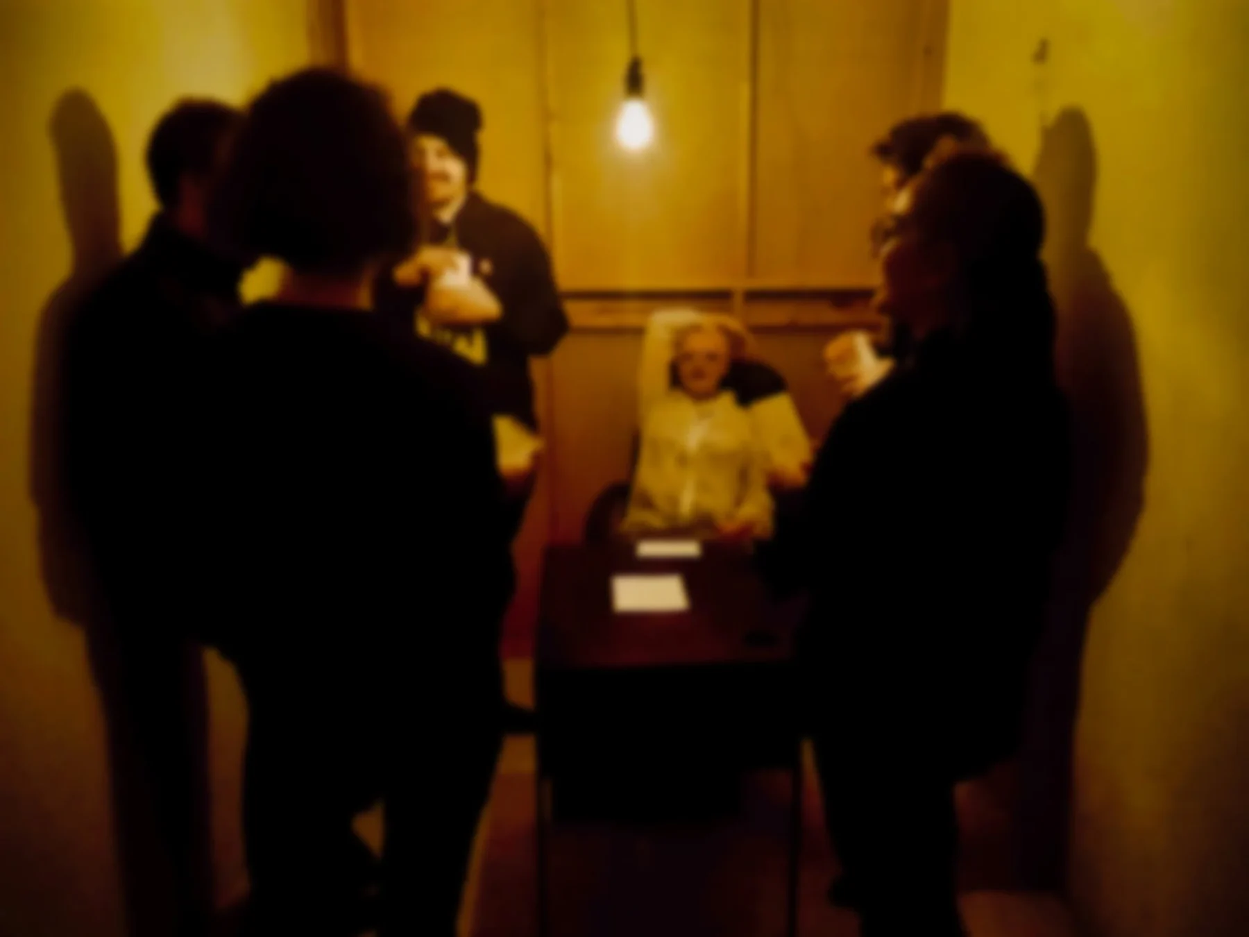 A group of Gameshow players in conversation.