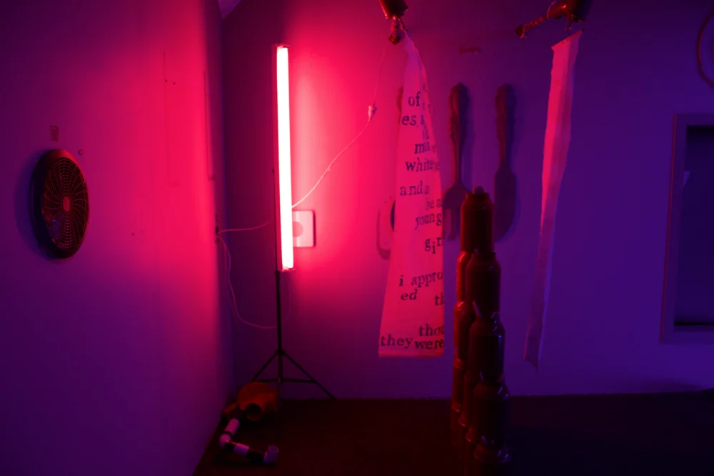 A pink and purple corridor in Choir of the Impossible.