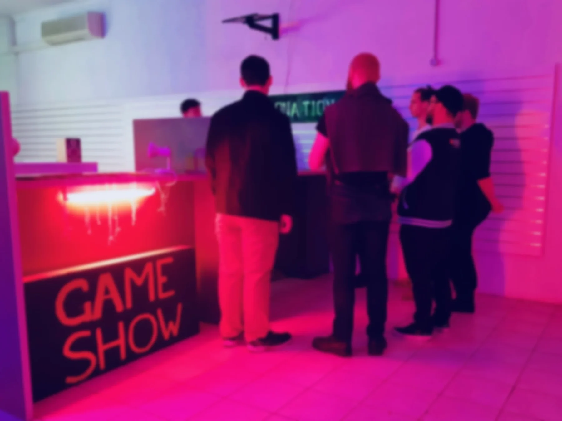 Visitors at the Gameshow entrance desk.